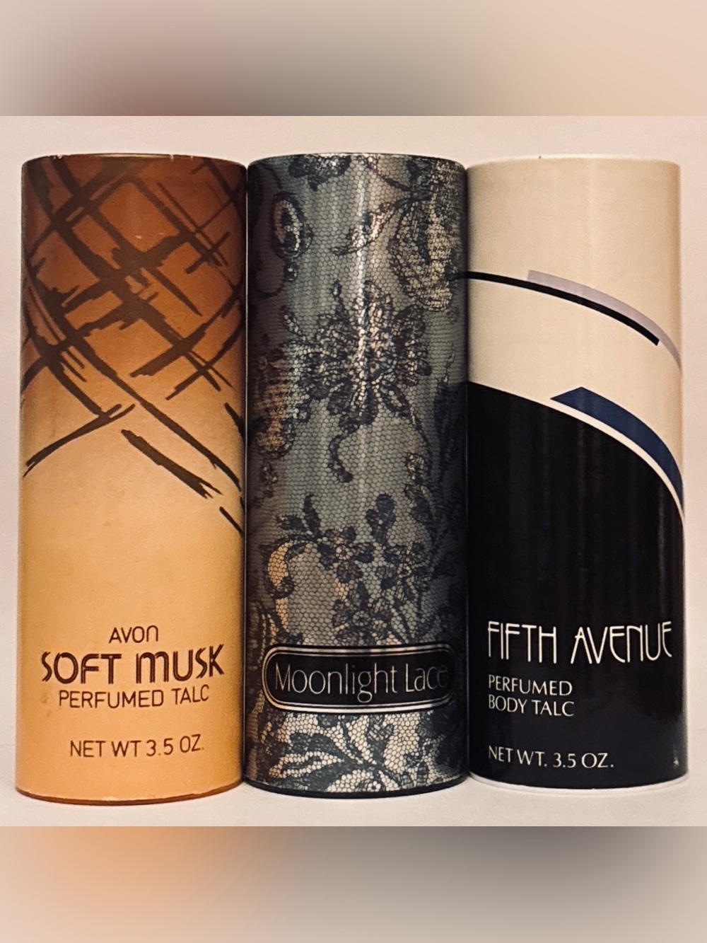Three (3) Avon perfumed body talcs: Soft Musk - Moonlight Lace - Fifth Avenue